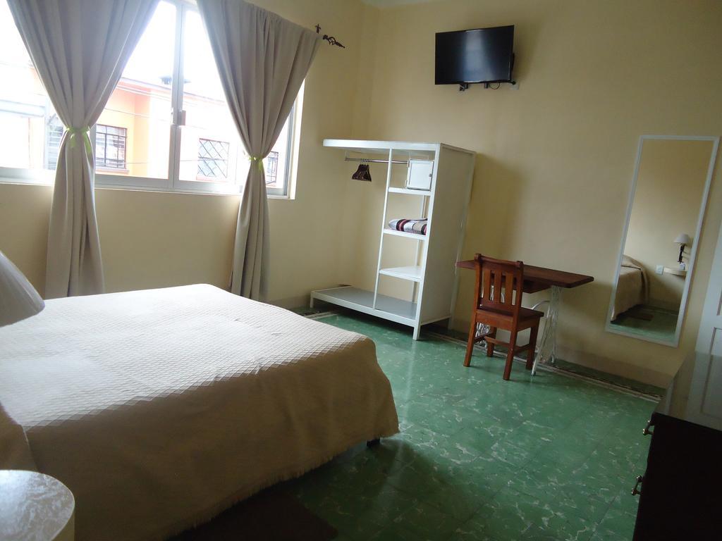 Hotel Suites Córdoba Habitación foto